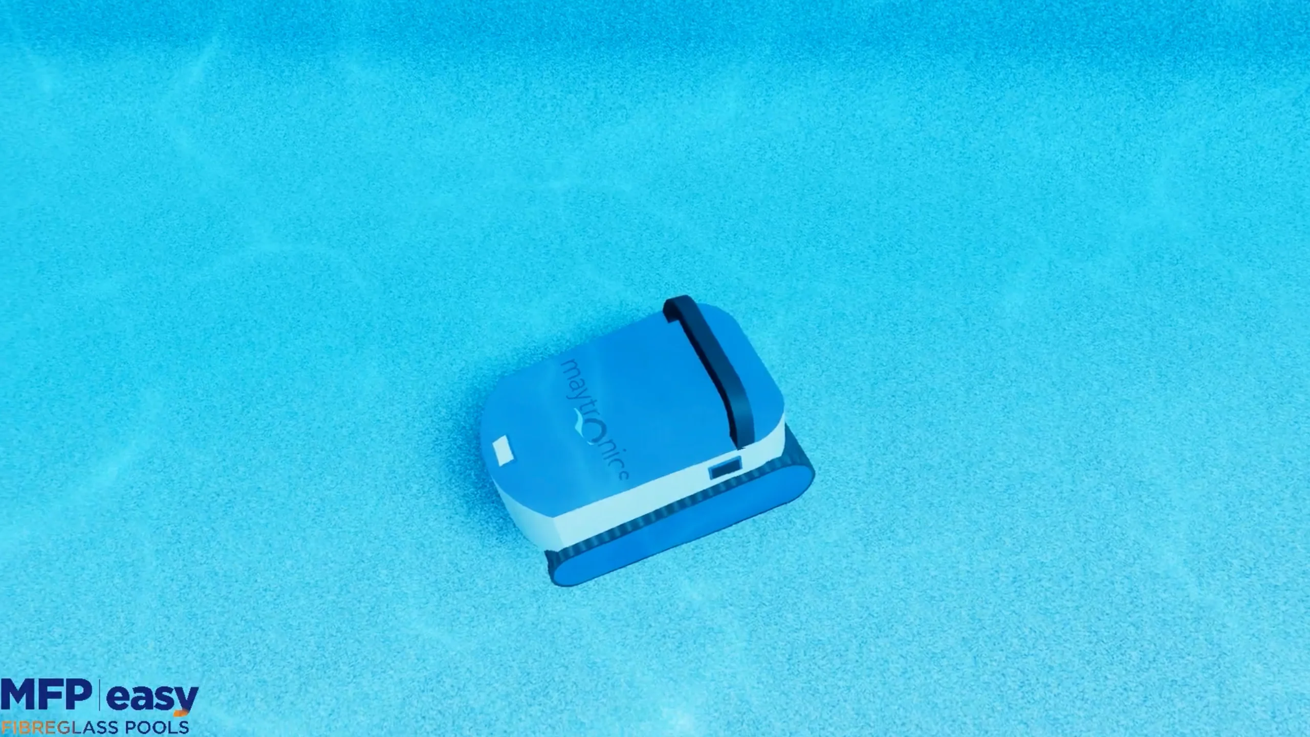 Robotic pool cleaner working across a blue gelcoat floor underwater