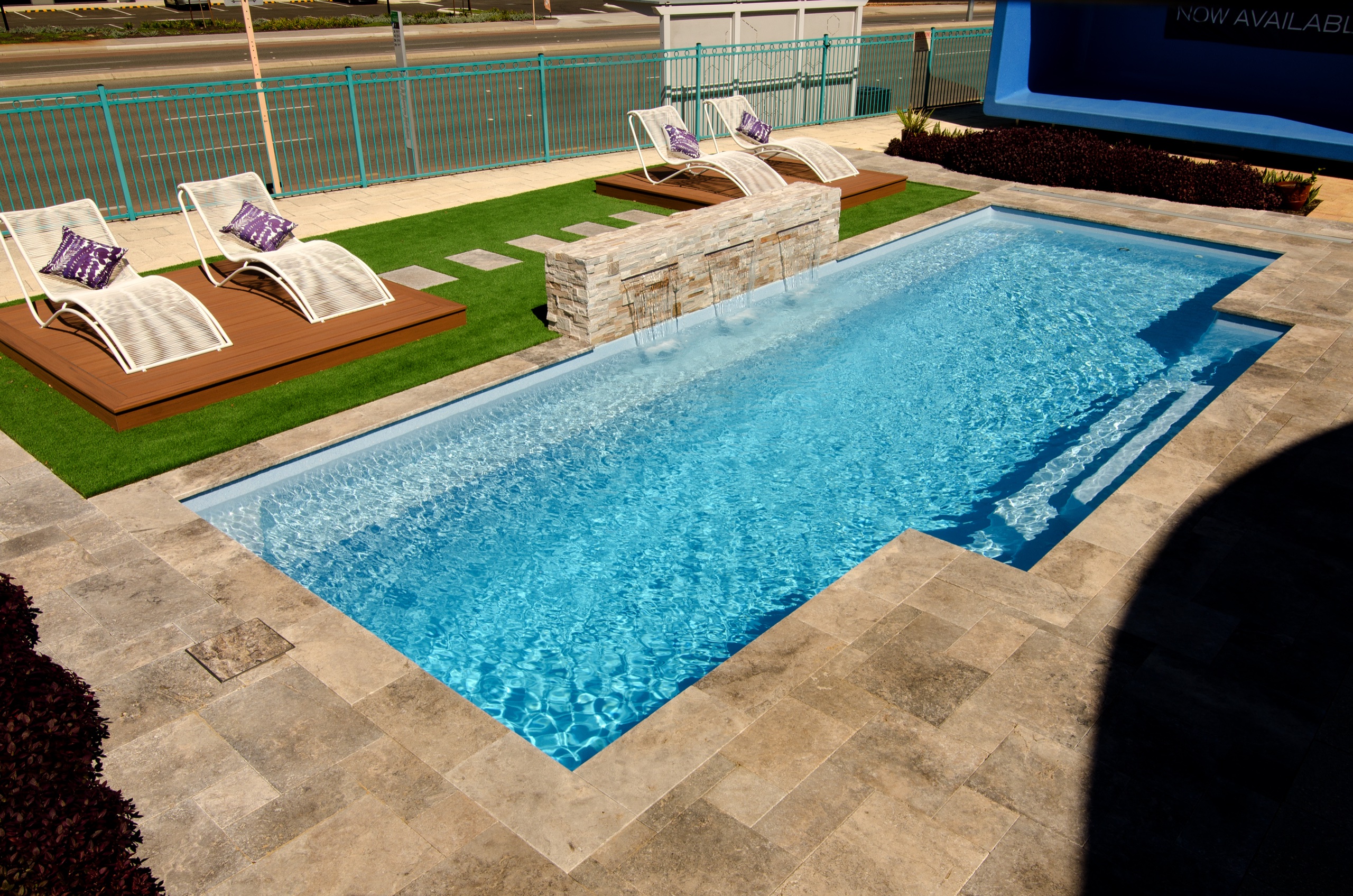 T-shaped fibreglass pool with a wider crossbar and a swimming leg